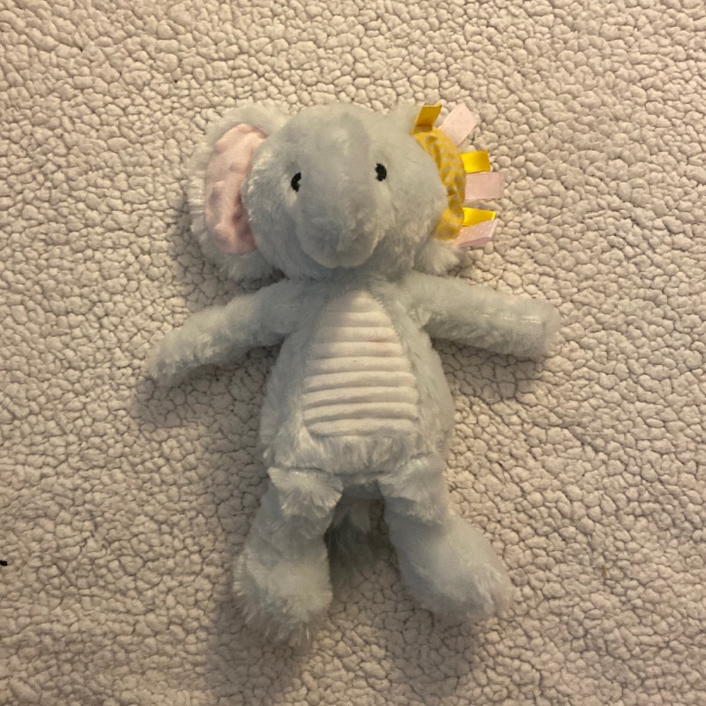 Rattling stuffed elephant with fidget tags